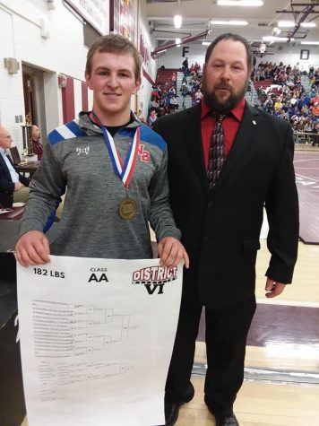 Derek Yingling and his father with Yingling's winning bracket