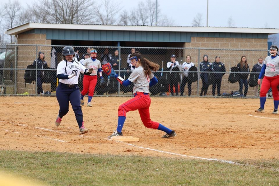 Sarah Betts makes a catch at first to finish the play.