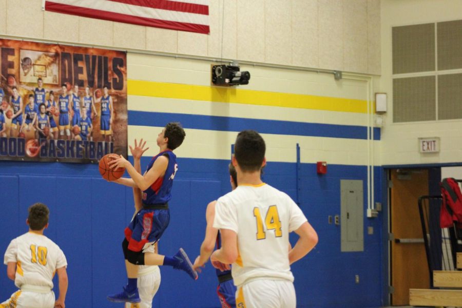 Trent drives to the basket during a JV game at Bellwood-Antis.