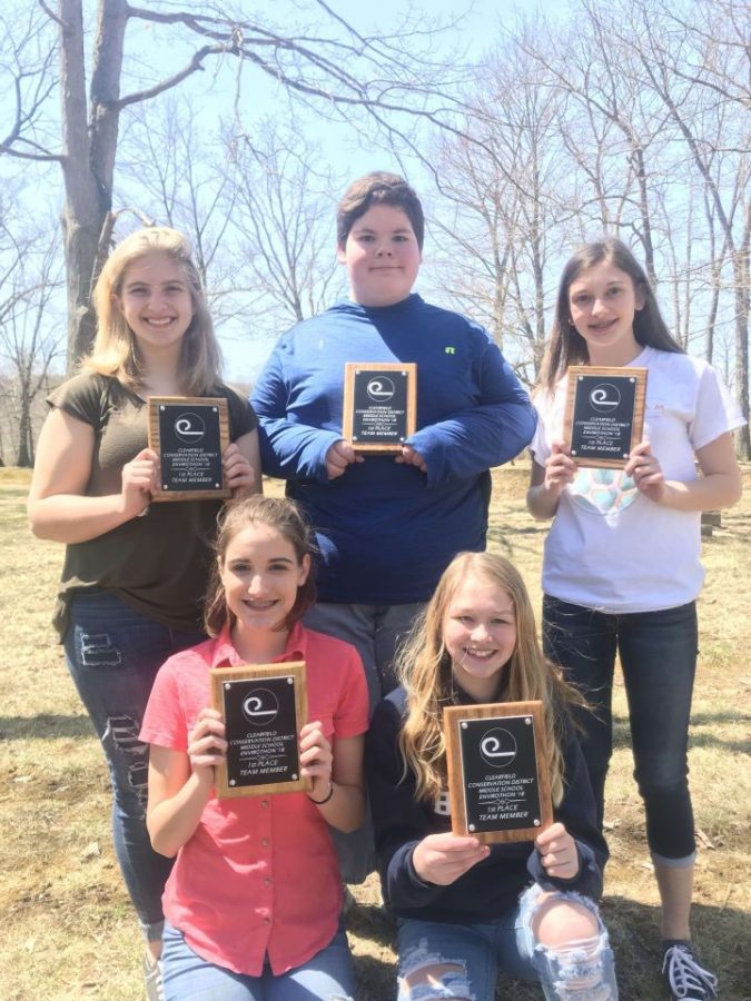 Katlyn Folmar, Noah Fry, Paige Washic, Olivia Blasko, and Rylee Sabol smile after winning first place at the county competition in 2018 