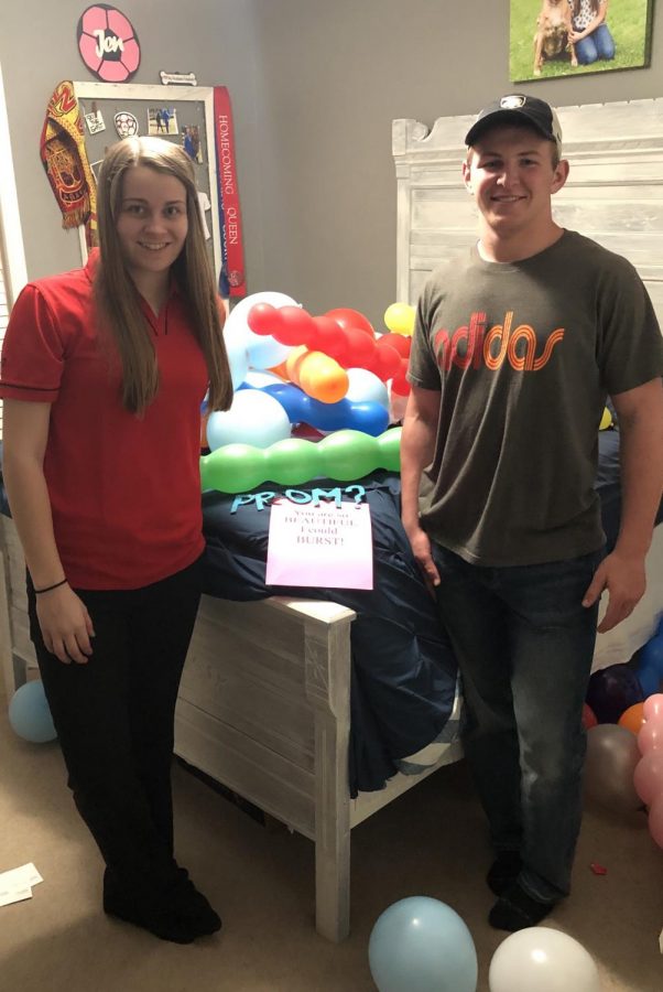 Derek surprises Jen with a promposal after a long day at work.