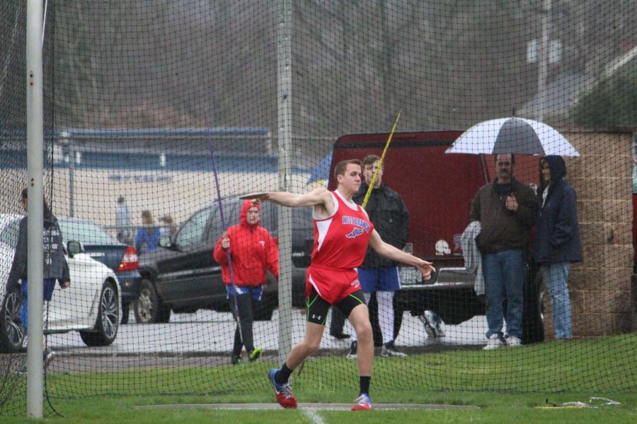 Larry winds up to throw a discus during a meet this season.