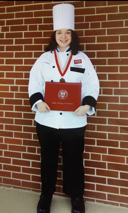 Aspen Galley poses for a picture after graduating from Indiana University of Pennsylvanias culinary school.