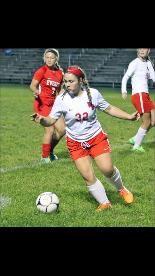 Eleyna Hanslovan dribbles the ball out of the defensive end of the field.