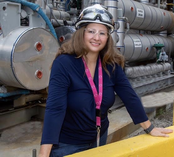 Barbara Buck, graduate of 1987, poses for a photo at work in South Charleston, West Virginia.