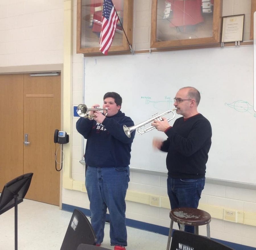 Dr. Stowman and Noah Fry during the Trumpet sectional.