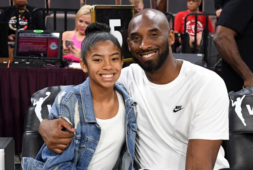 Kobe+Bryant+and+his+daughter+Gianna+sitting+courtside+at+the+2019+WNBA+All-Star+Game.