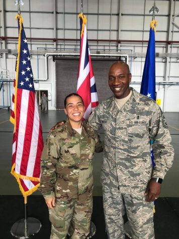 Rachelle Turner and a colleague pose for a photo during a work day in RAF Mildenhall, United Kingdom.