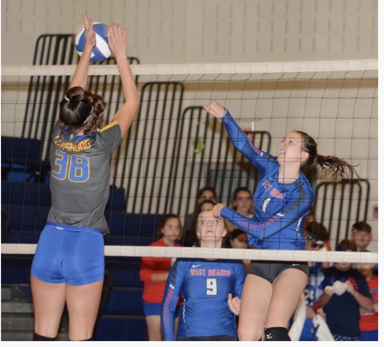 Taylor Myers appraoches the net for a kill.