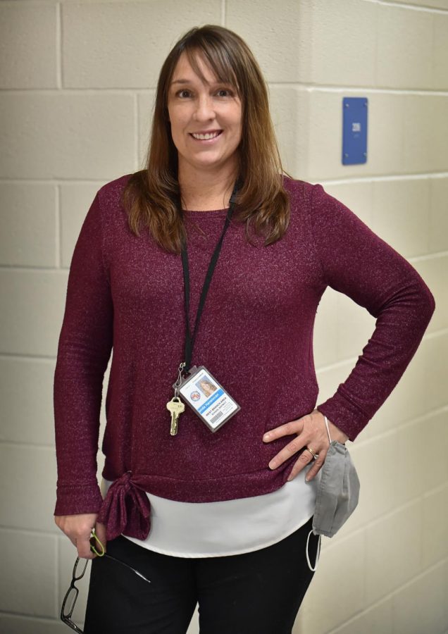 Mrs. Hanslovan poses for a photo before beginning a new school day.
