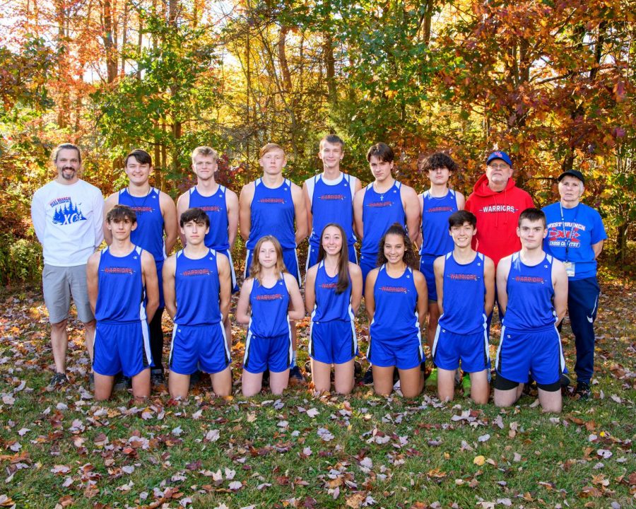 West Branch Cross Country team smiles for a photo.