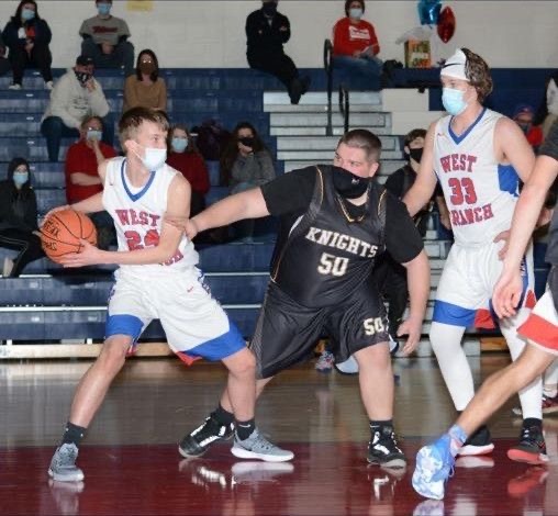 D. Kolesar grabs the rebound over Jayden Coter and Immediately looks upcourt for a quick outlet.