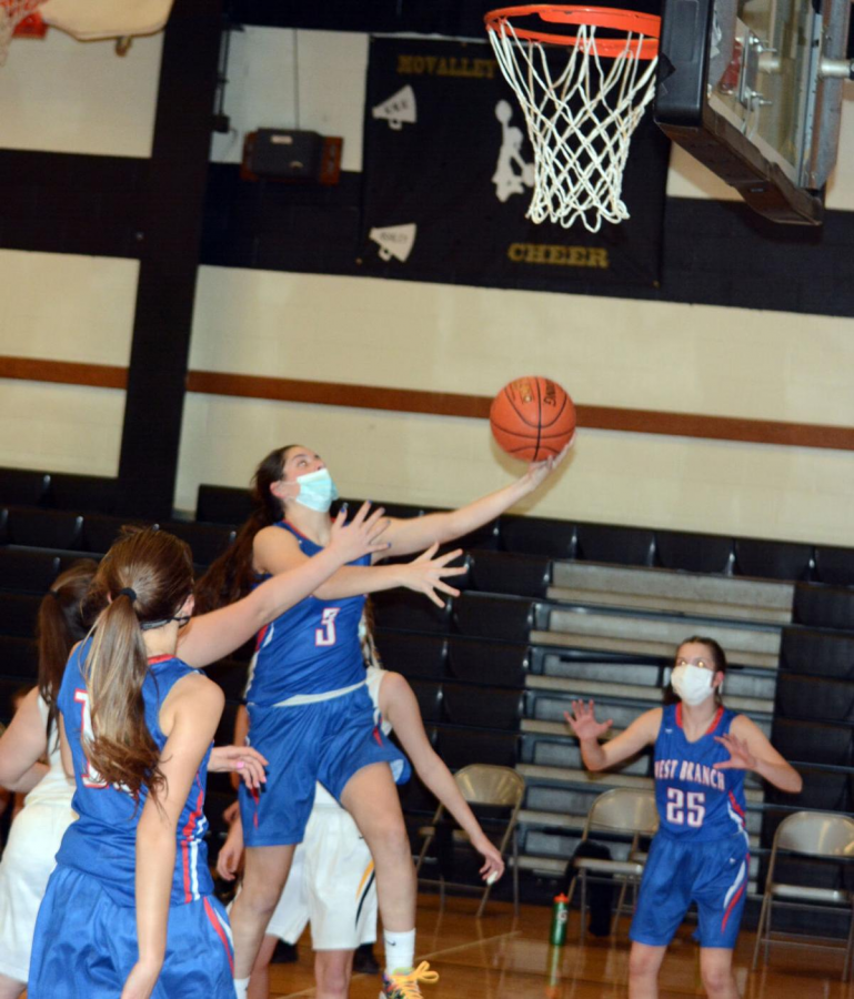 Photo caption: Sarah Betts goes in for a layup on Monday night’s game against Moshannon Valley Damsels.