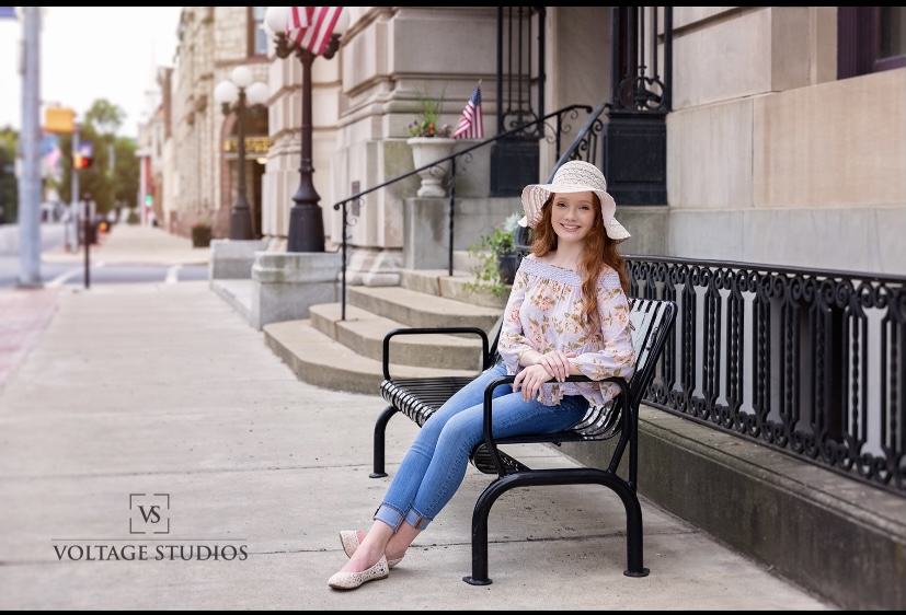 Ashley Folmar posing for some senior pics on a nice day