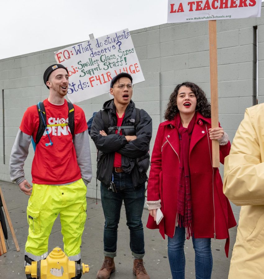 John+Walker+protests+with+colleagues+in+a+Los+Angeles+teacher+strike+in+2019%2C+wearing+vibrant+yellow+pants.