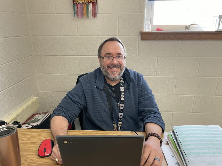 Mr. McCamley working at his desk on the last day of the third marking period.