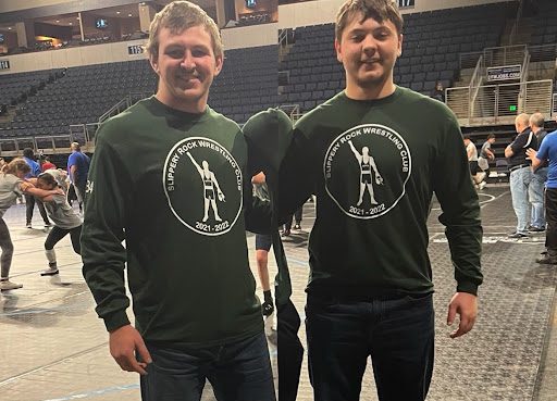 Derek and Ethan pose for a photo after competing at the NCWA national tournament.