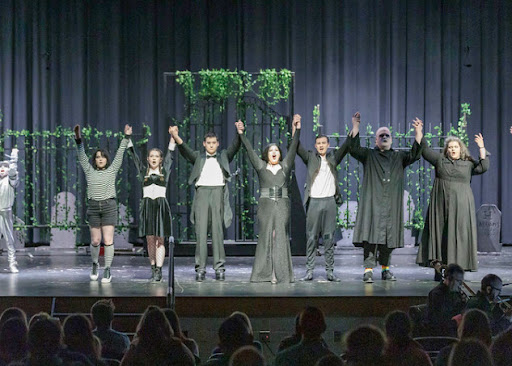 The students playing the members of the Addams family take a bow. From left to right: Bailey Wooster, Carrie Fuller, Jonathan Hoover, Raven Myers, Doug Howe, Brendan Zetts, Vesta Brickley