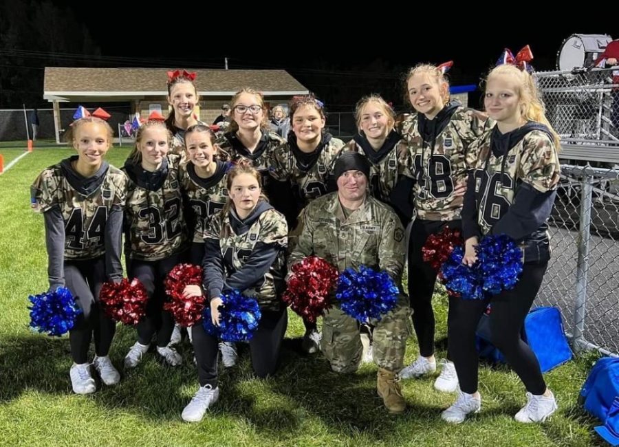 The cheer squad supports the U.S. National Guard at the WB vs. Conemaugh Township football game.