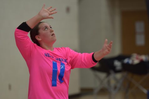 Shianna Hoover serves the ball to earn an ace for her team.