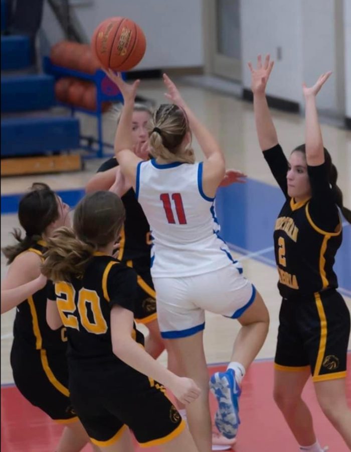 Jenna+Mertz+goes+for+a+lay-up+as+Northern+Cambria+defenders+surround+her.