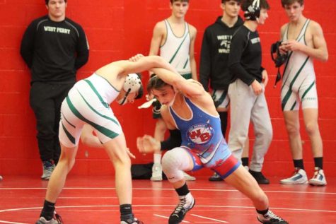 West Branch’s Landon Bainey wrestles a competitor from West Perry.