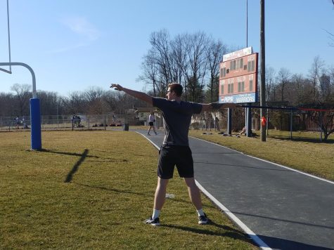 Junior Logan Kolp tries out Javelin on a recent chilly, outdoor practice.