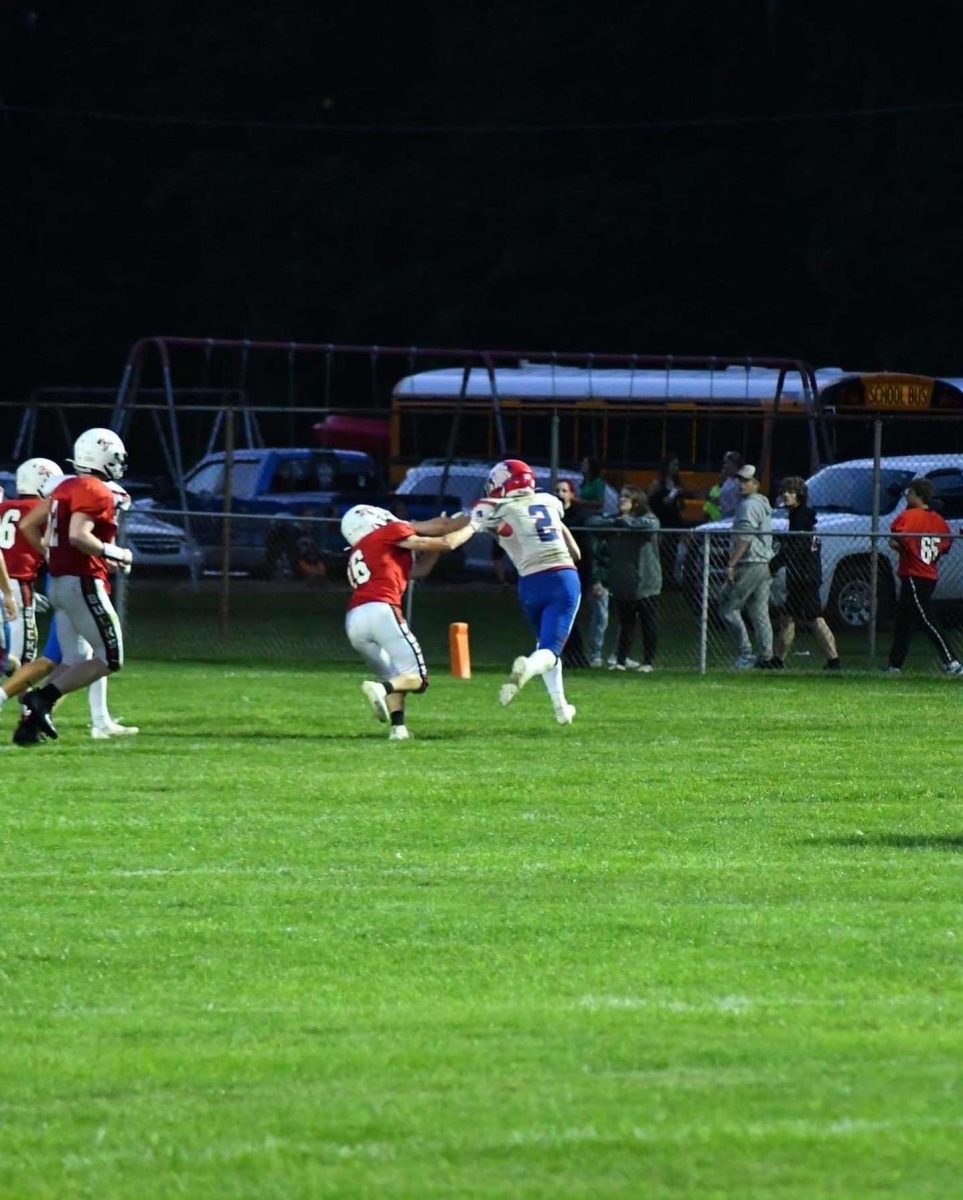 Azadio Vargas rushes to score the second Warrior touchdown against Bucktail.
