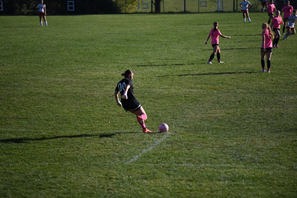 Alexa Prestash defending the Lady Warrior’s goal in the home Pink out game.
