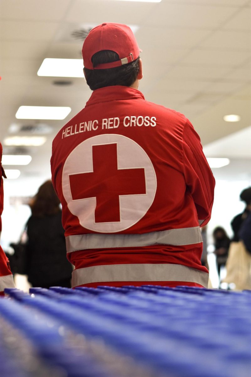 A+photo+of+a+Red+Cross+employee+wearing+their+uniform.%0A%0A