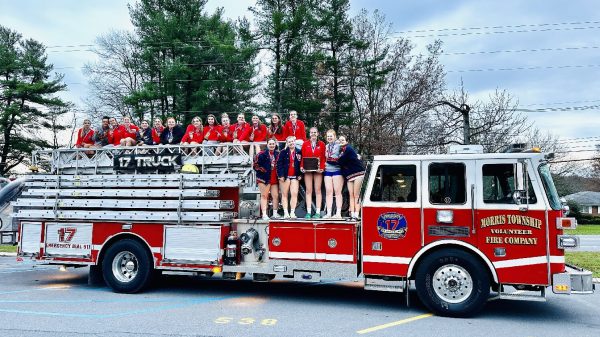 The Lady Warrior volleyball team on the fire truck after winning the District 6 Championship.
