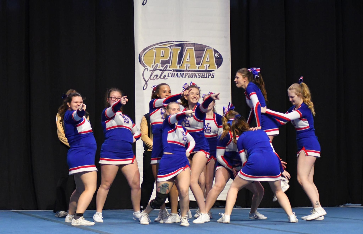 The West Branch Lady Warrior Competition Cheer team competing in states.  
