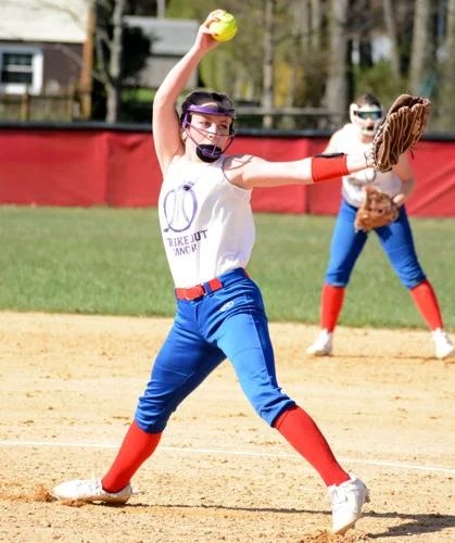 Carsyn Wesesky winds up on the mound to throw a pitch. 
