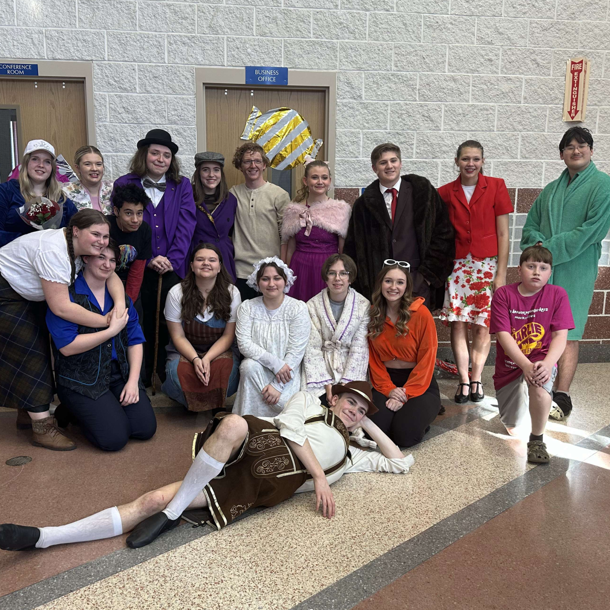 Cast photo including the five graduating seniors from the performance of Charlie and the Chocolate Factory.