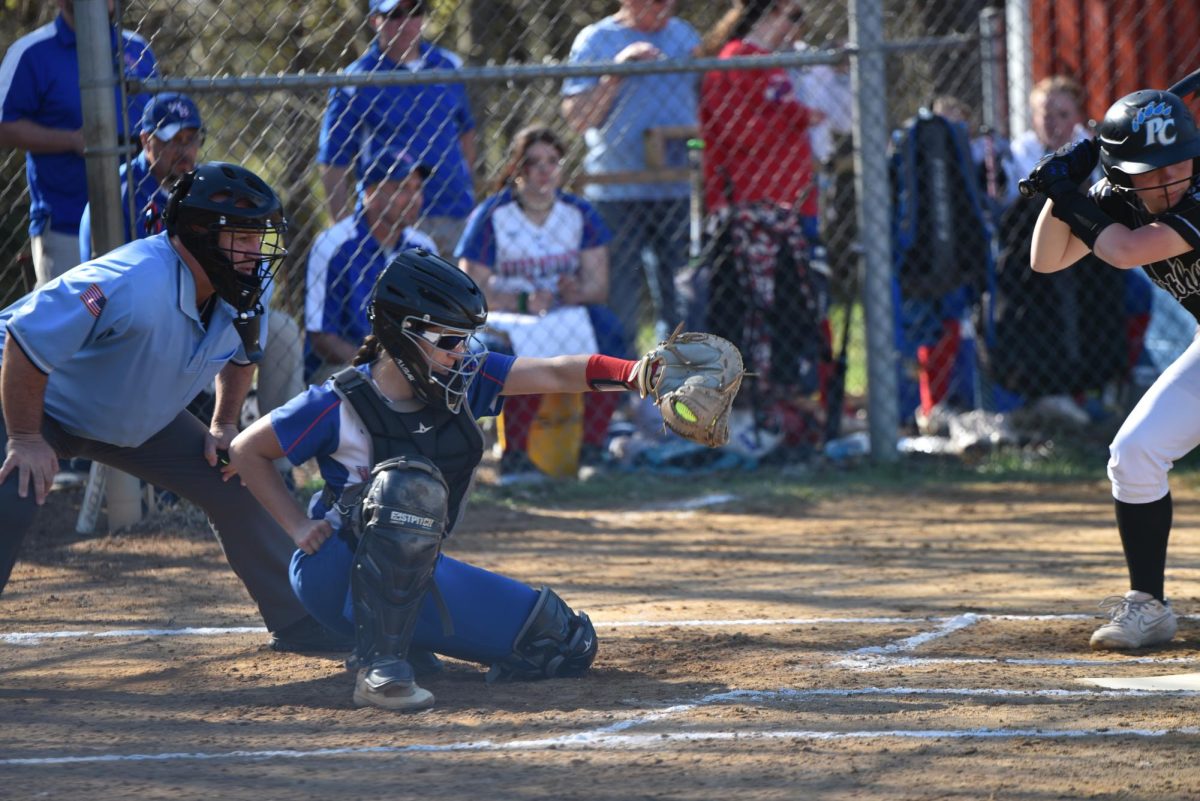 Greysyn Gable behind the plate for the West Branch Lady Warriors. 