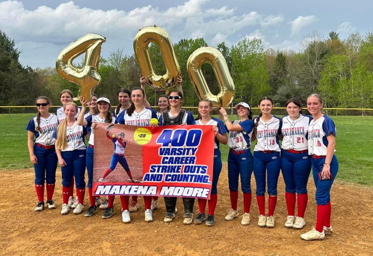 The Lady Warriors celebrating Makenna’s 400th varsity career strikeout after beating Mount Union. 