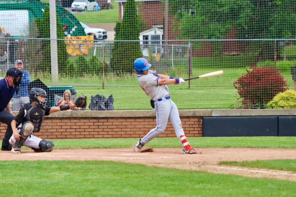 Luke Liptak takes a swing at a pitch in the Warrior victory.
