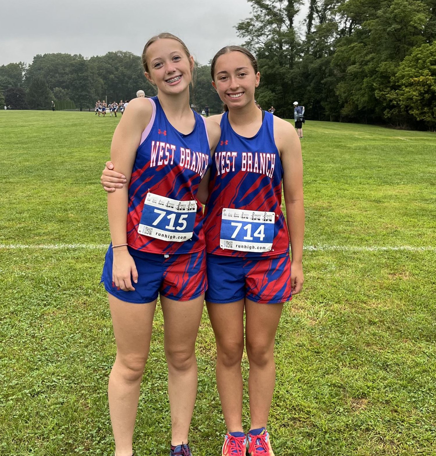 Freshman runners, Alexis Condon and Ashley Causer, celebrate their first varsity meet at Big Valley.