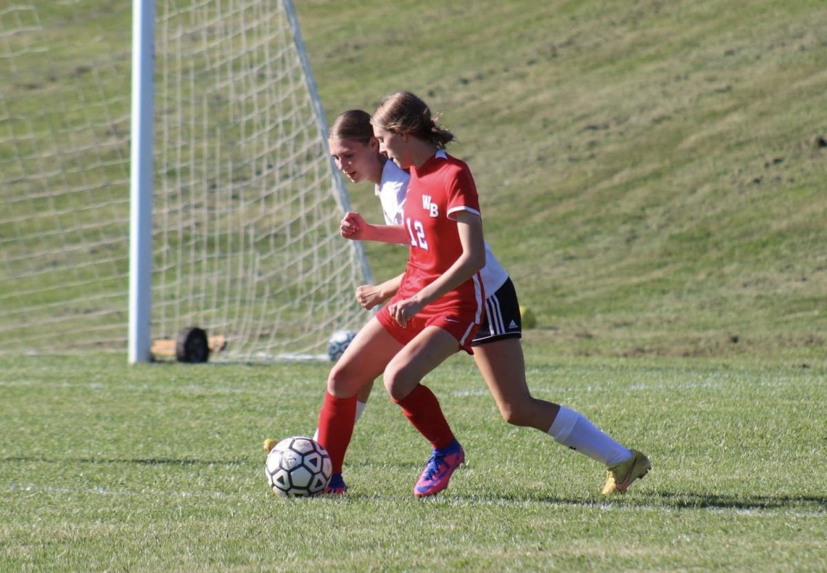 Sydney Sankey dribbles around a defender during Northern Bedford where she scored three goals. 