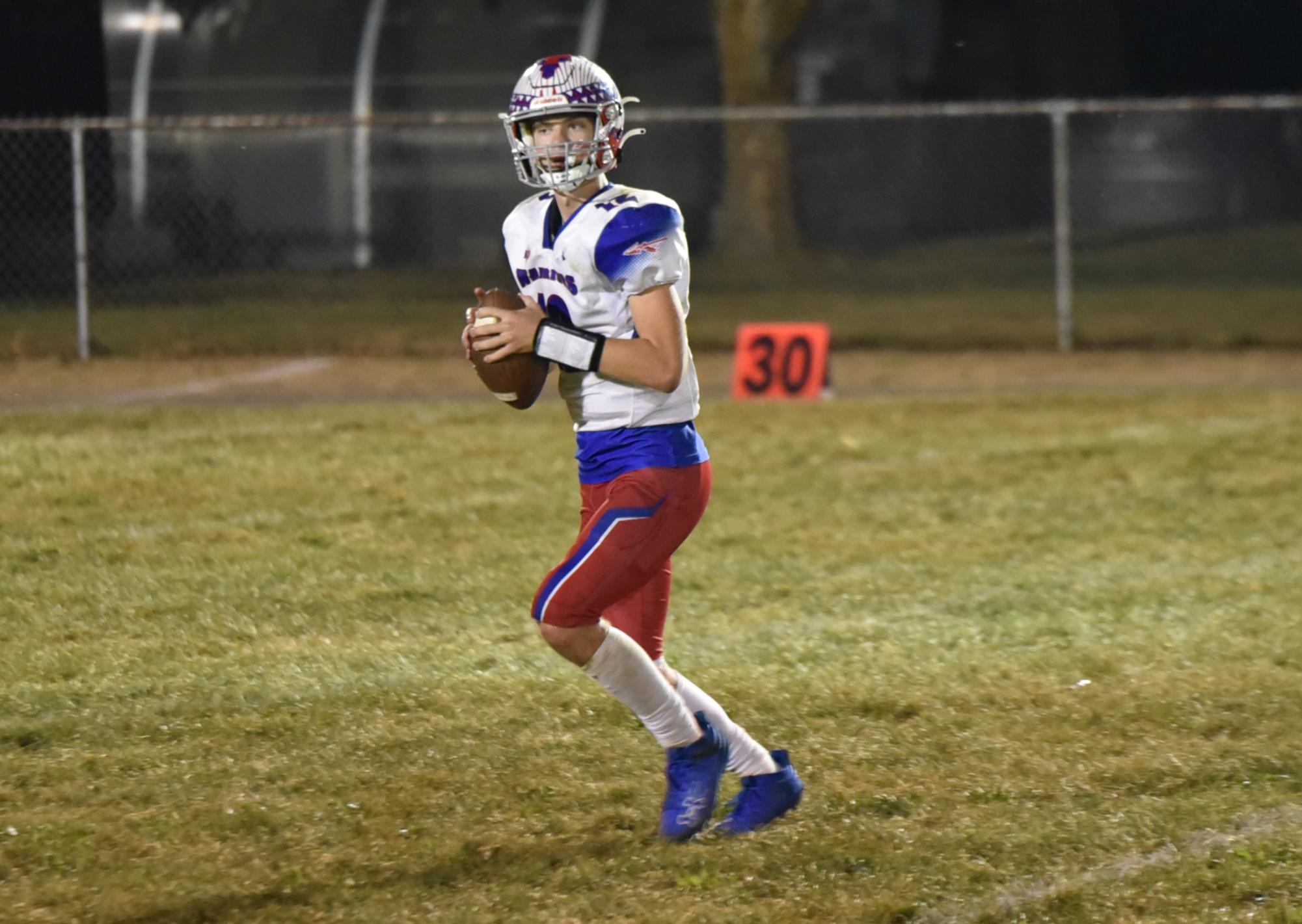 Conner Danko drops back to pass the ball against Juniata Valley. 