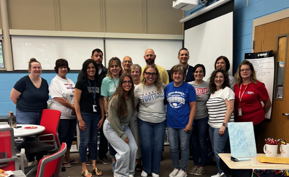 High school principal, Brandy O’Hare on her last day at West Branch having lunch with staff members.