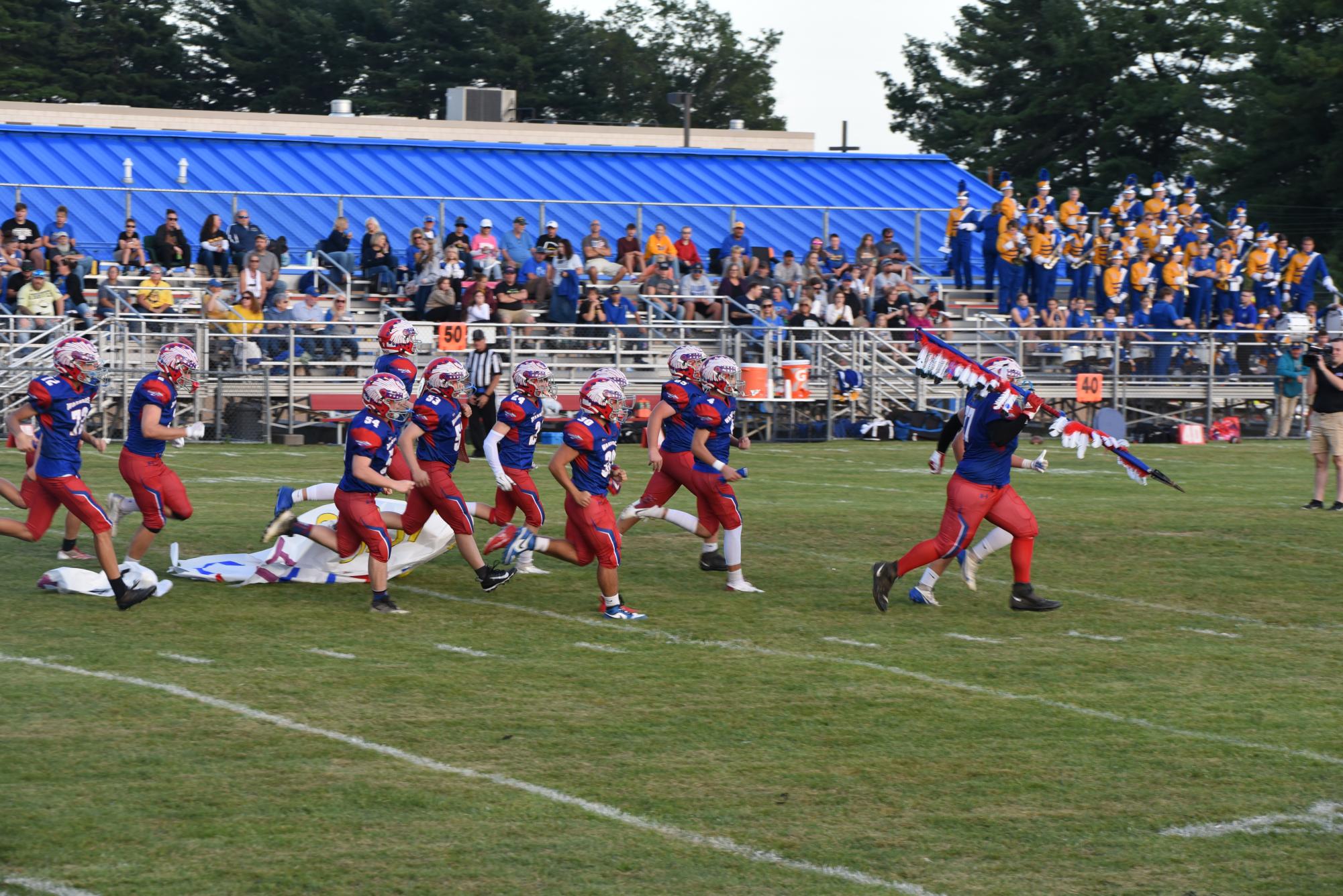 The Warriors running out to their second home game against the Claysburg-Kimmel Bulldogs.