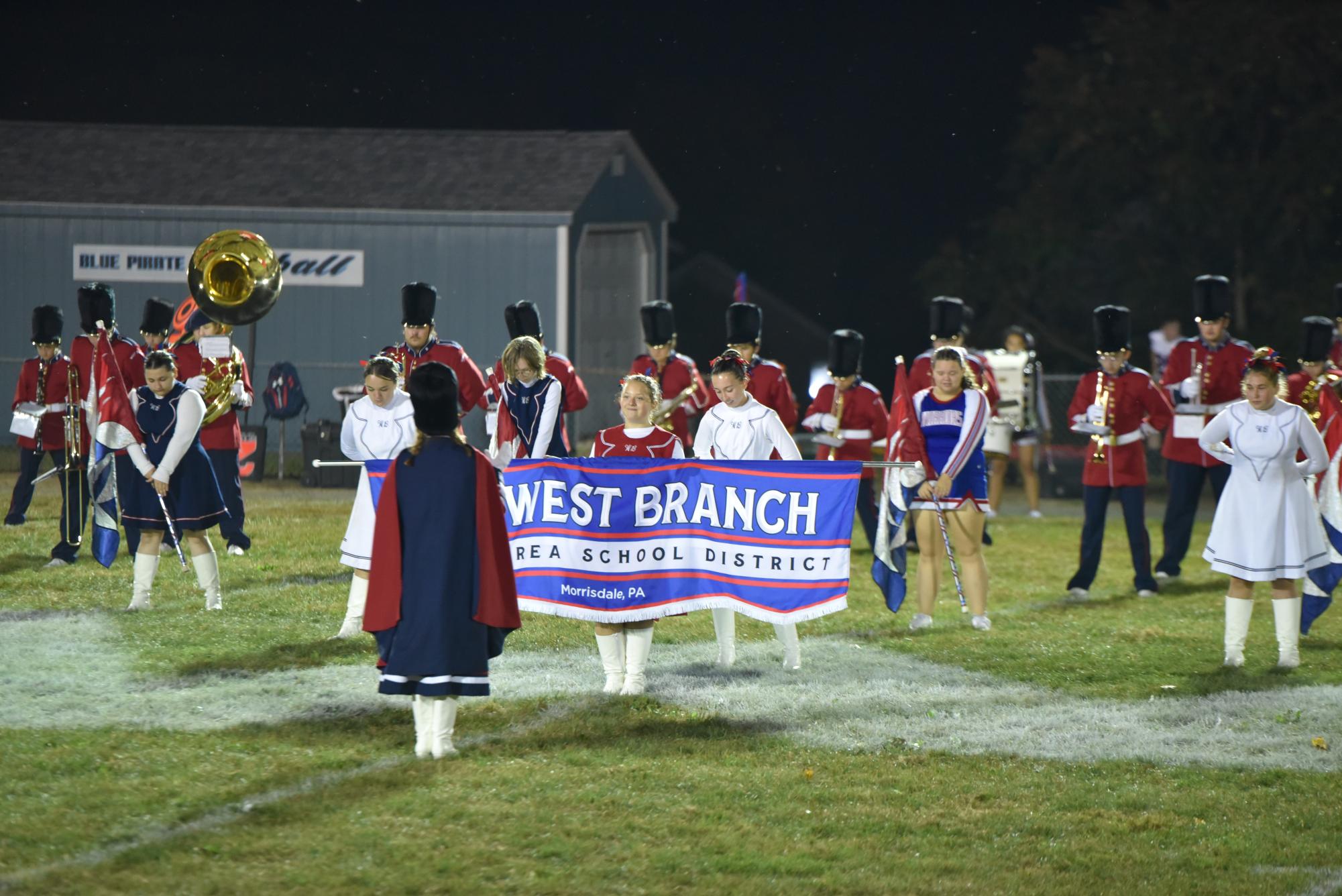 The Warrior Marching Band waiting to take the field at Williamsburg 
