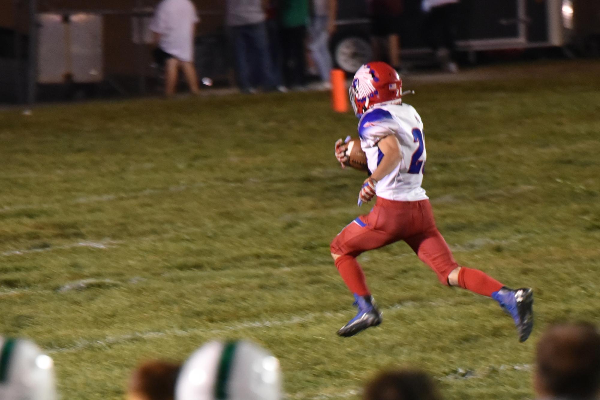 Kurtis Fetters running in the Warriors’ second touchdown of the night.