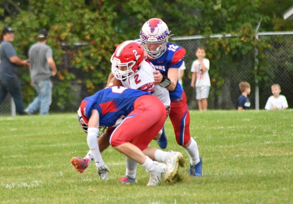  Logan Liptak and Conner Danko team up to make the tackle