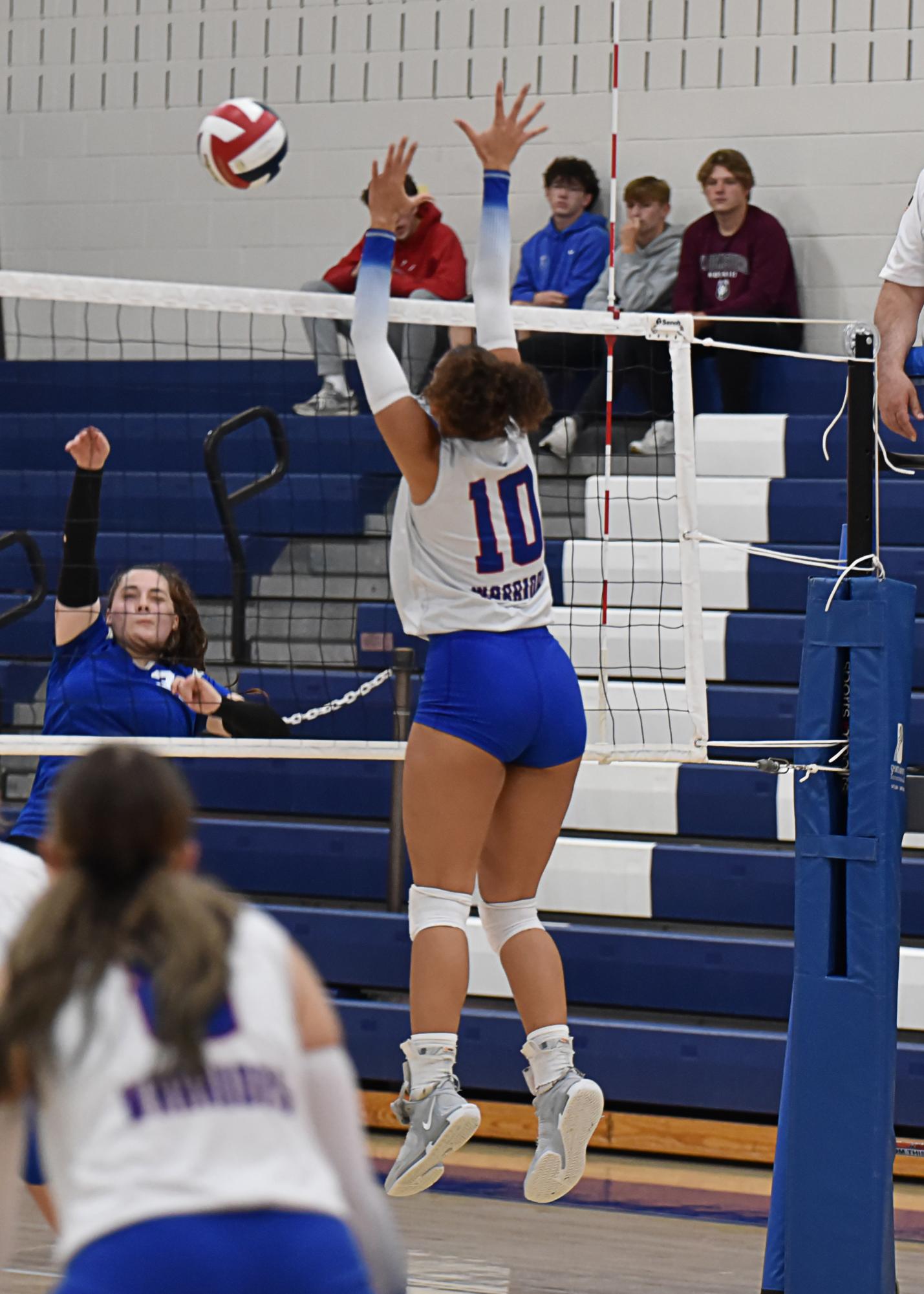 Makiya Mack goes up for the block in the game against Williamsburg.