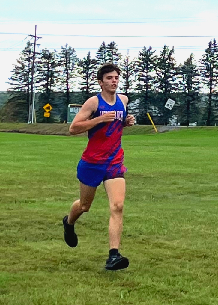 Dylan Ryder running at Southern Fulton for the ICC conference meet