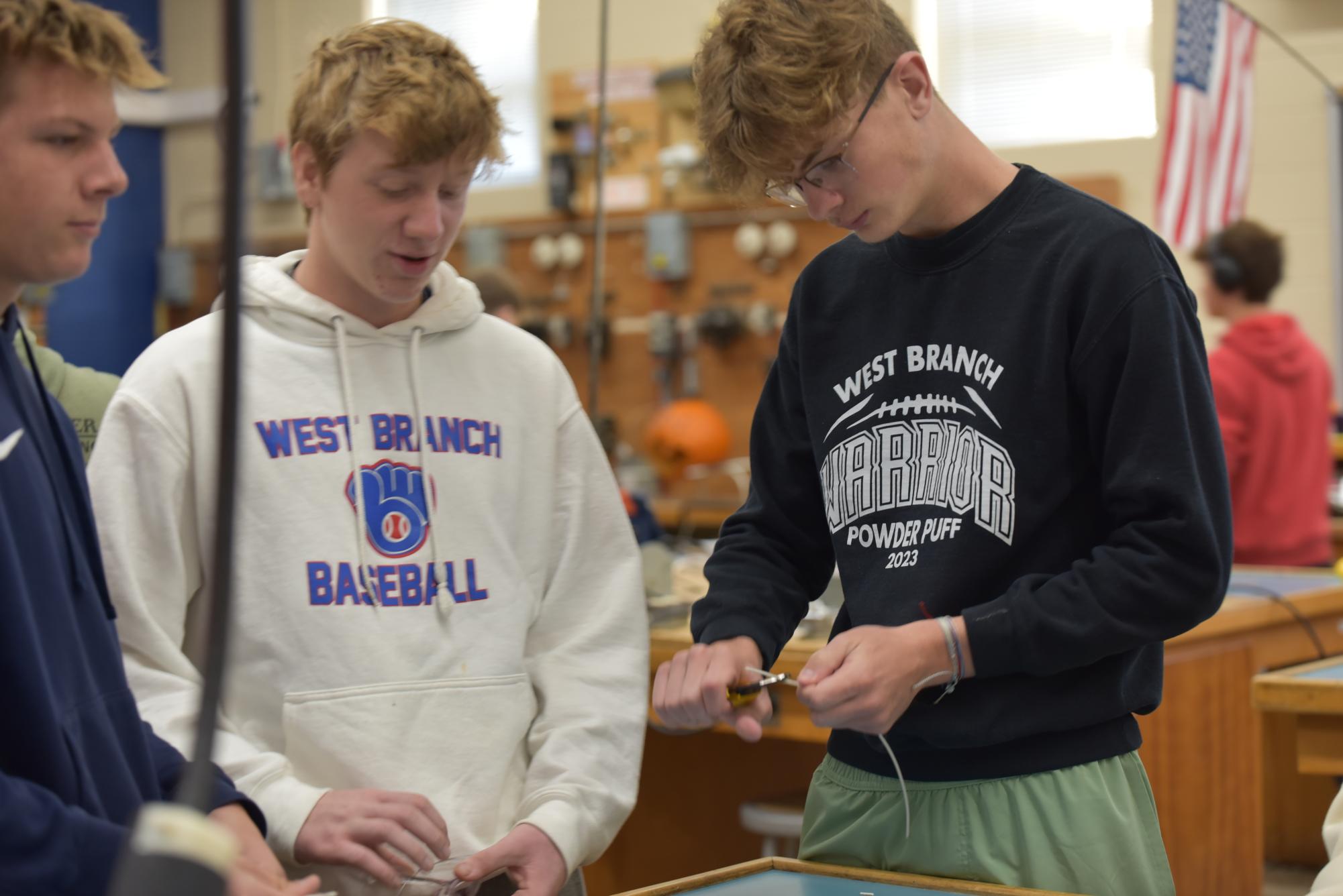 West Branch sophomores Conner Danko and Justin Esposti take on an activity while visiting the electrical program. 