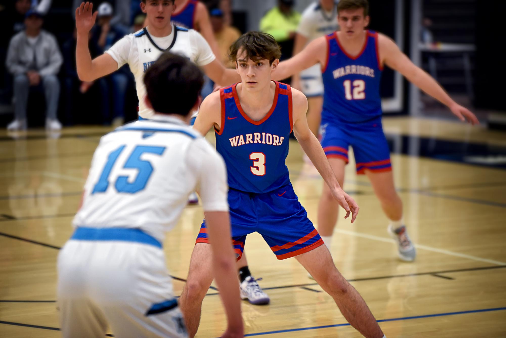 Dylan McGonigal locks in on defense in his game against River Valley.