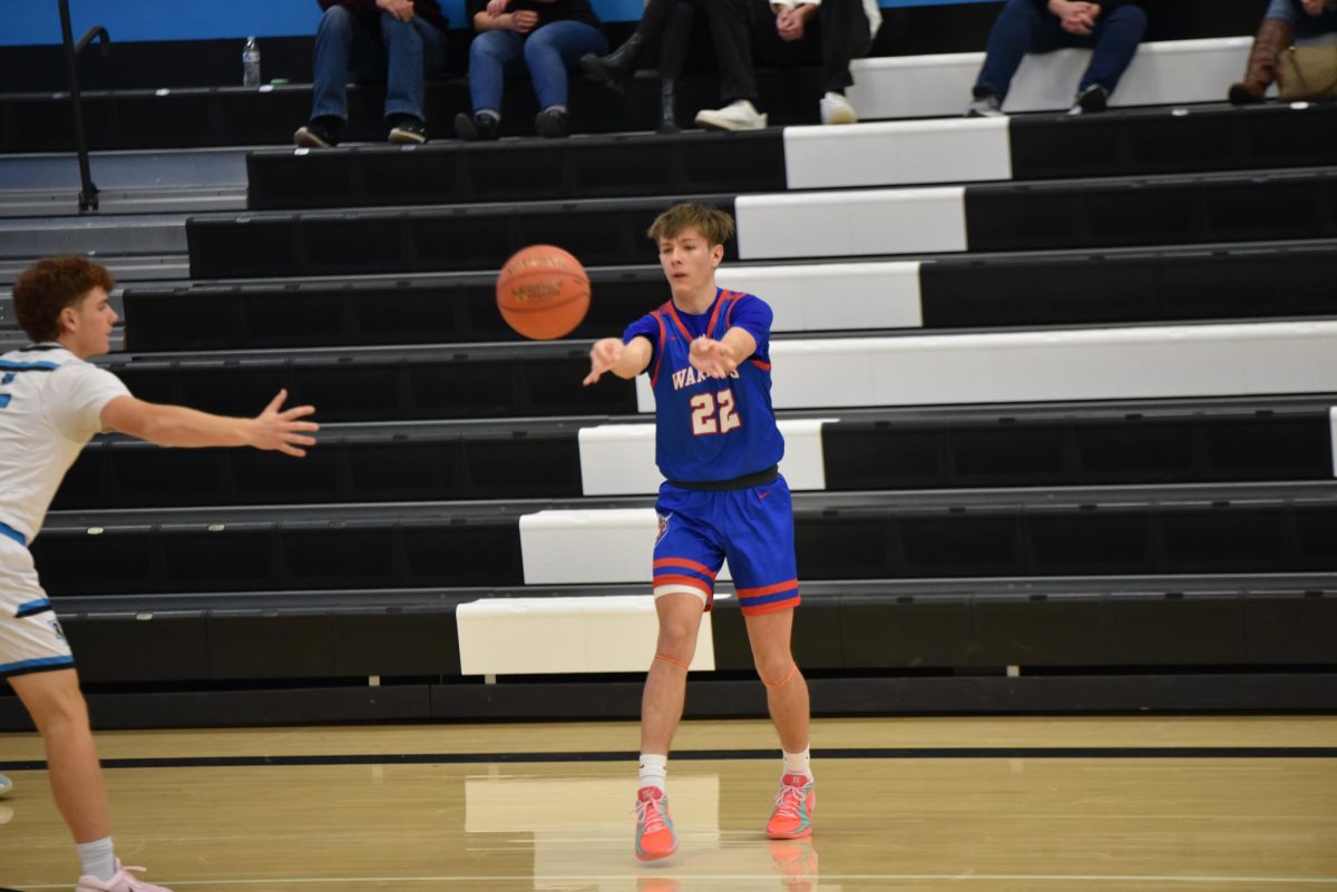  Emigh passes to one of his teammates against River Valley.
